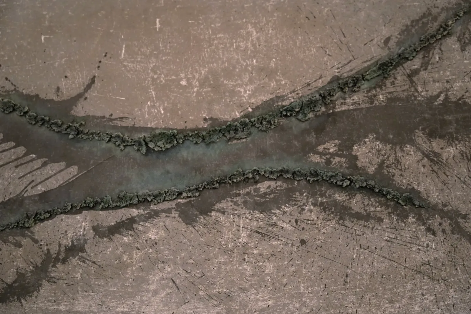 Close-up of Unearthing Series #2 by Eleanor Herbosch showing two ridges of raised London Clay converging across the canvas