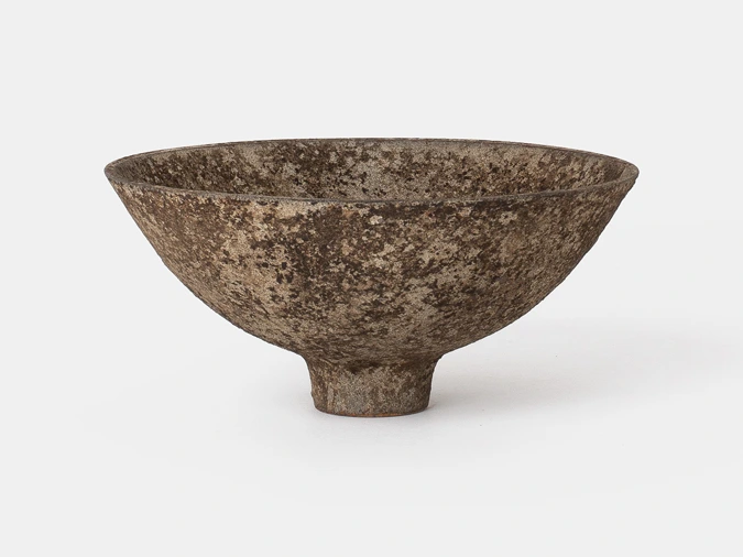 Bowl II by Louis Vincent, a wide shallow footed bowl with a mottled brown and stone-coloured surface, seen from the side