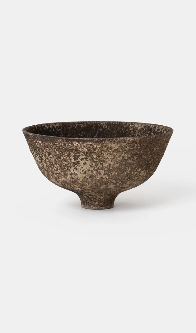 Bowl III by Louis Vincent, a deep footed bowl with a mottled brown and stone-coloured surface, seen from the side