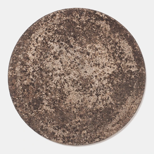 Plate IV by Louis Vincent seen from above, a flat disc with a light mottled clay surface
