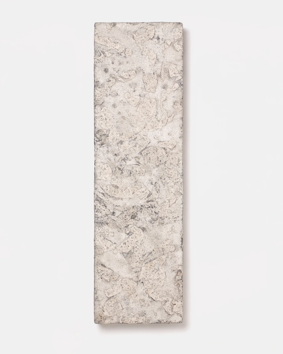 Wall Panel IV by Louis Vincent, a pale panel with a cream and grey textured clay surface
