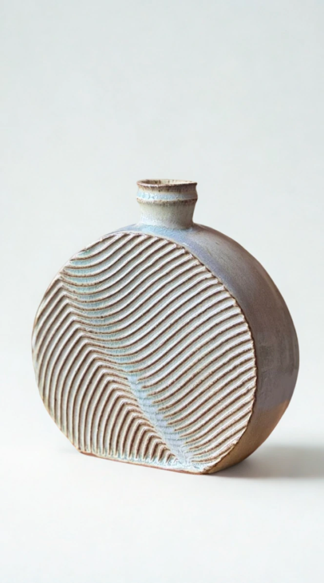 Round Bud Vase by Lucia Ocejo with an incised wave pattern